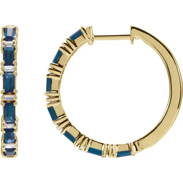 Pair of 14k yellow gold sapphire hoop earrings, measuring 2 mm thick, with fourteen GIA Type II Clarity AA, round brilliant cut sapphires. The sapphires have a total weight of 1.26 carats, and are prong set. In addition, there are twelve baguette diamonds, G-H color, I1 clarity, with a total weight of 1.25 carats.