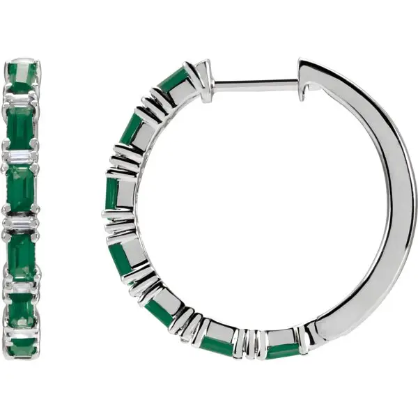 Pair of 14k white gold emerald baguette hoop earrings, measuring 2 mm thick, with fourteen GIA Type II Clarity AA, baguette cut emeralds. The emeralds have an approximate total weight of 1.26 carats, and are prong set. In addition, there are twelve baguette diamonds, G-H color, I1 clarity, with a total weight of 1.25 carats. The earrings weigh approximately 4.35 grams.