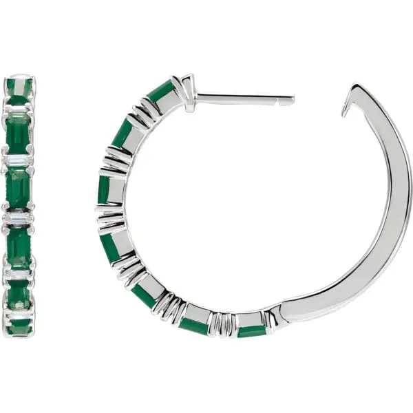 Pair of 14k white gold emerald baguette hoop earrings, measuring 2 mm thick, with fourteen GIA Type II Clarity AA, baguette cut emeralds. The emeralds have an approximate total weight of 1.26 carats, and are prong set. In addition, there are twelve baguette diamonds, G-H color, I1 clarity, with a total weight of 1.25 carats. The earrings weigh approximately 4.35 grams.