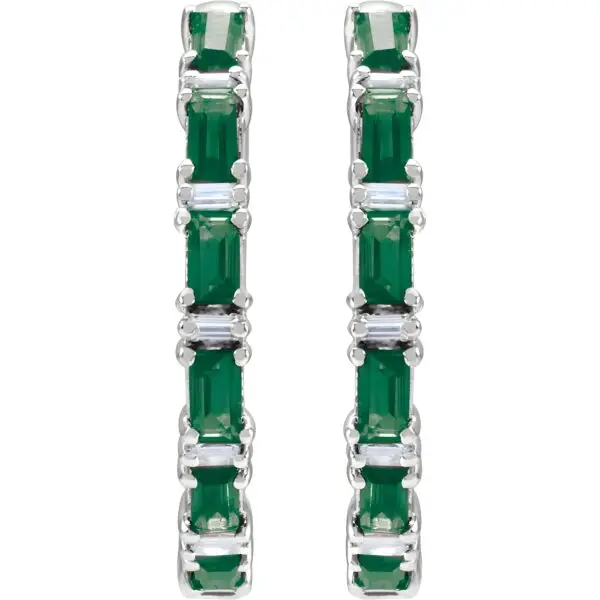 Pair of 14k white gold emerald baguette hoop earrings, measuring 2 mm thick, with fourteen GIA Type II Clarity AA, baguette cut emeralds. The emeralds have an approximate total weight of 1.26 carats, and are prong set. In addition, there are twelve baguette diamonds, G-H color, I1 clarity, with a total weight of 1.25 carats. The earrings weigh approximately 4.35 grams.