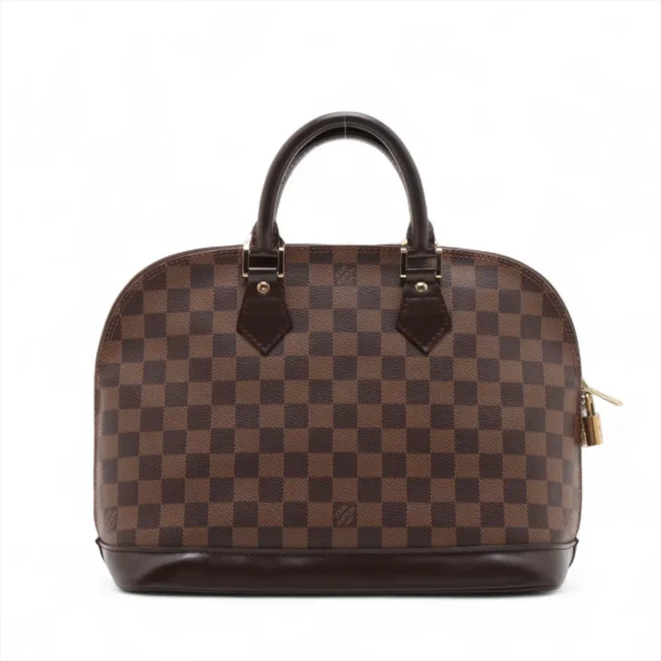 Full rear view of the Louis Vuitton Damier Ebene Alma PM with dark brown leather handles and gold-tone zipper.